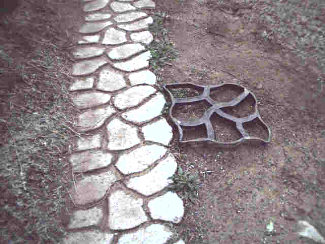 Path form next to poured blocks